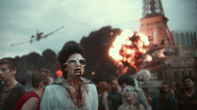 Zombie Elvis in front of exploding Vegas