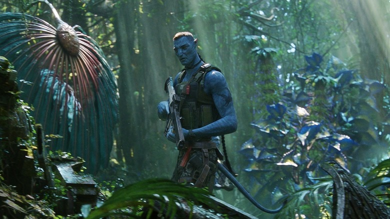Quaritch walking through the jungle