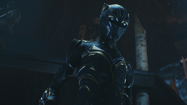 Shuri wearing the Black Panther suit