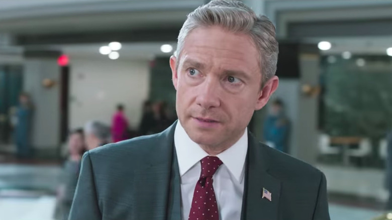 Agent Everett Ross glancing sideways