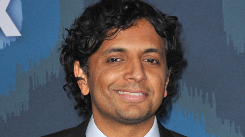 M. Night Shyamalan smiling