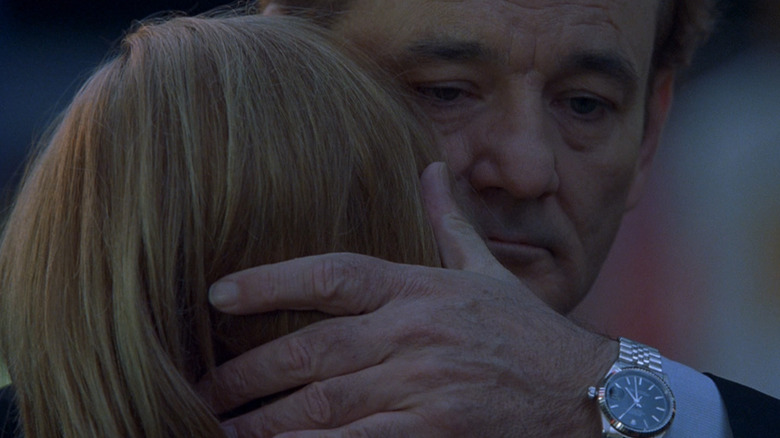 Bob whispers to Charlotte