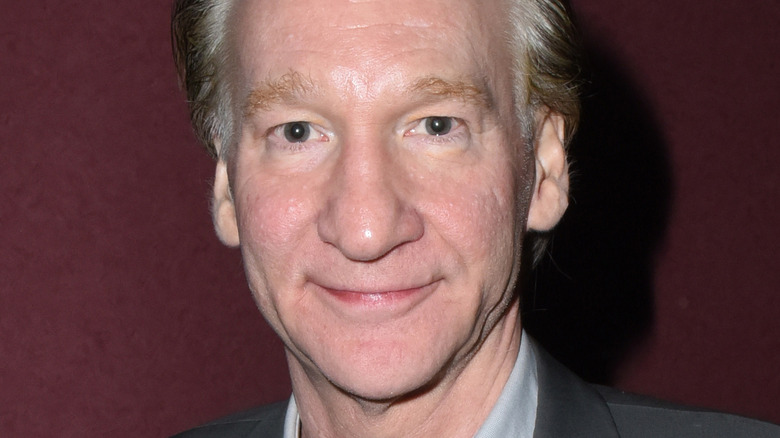 Bill Maher smirks