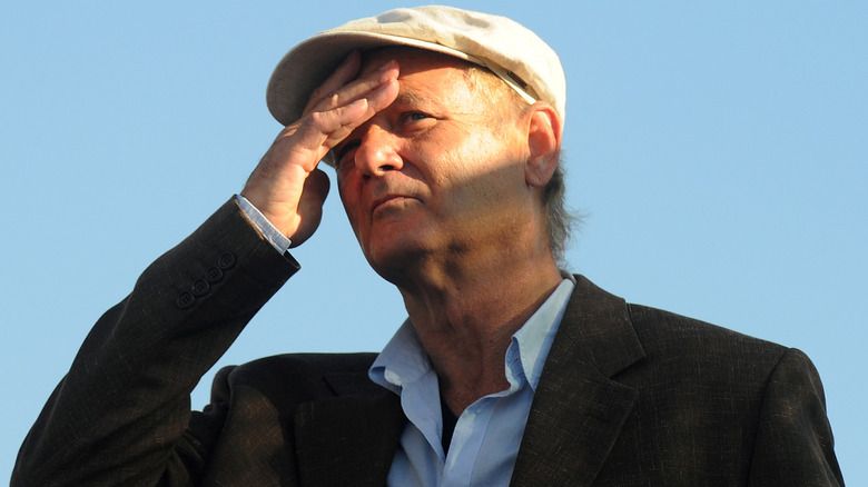 Bill Murray shielding eyes