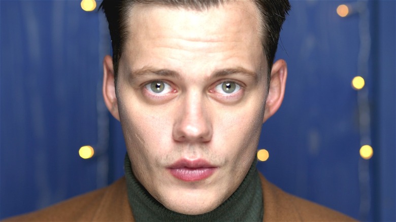 Bill Skarsgard looking into camera