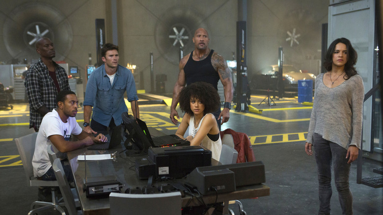 The Fate of the Furious' lead characters assembling to come up with a plan