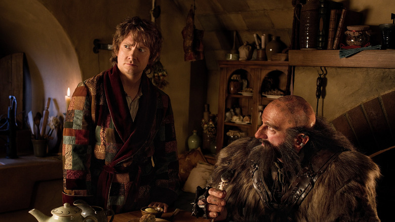 Bilbo Baggins surveying the dwarves in his home in The Hobbit: An Unexpected Journey
