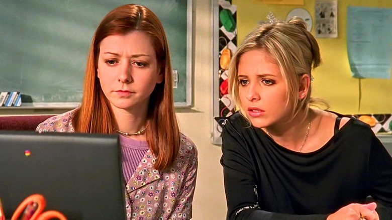 Willow and Buffy looking at a computer in "Buffy the Vampire Slayer"