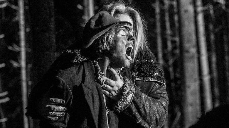 A woman screams in the woods