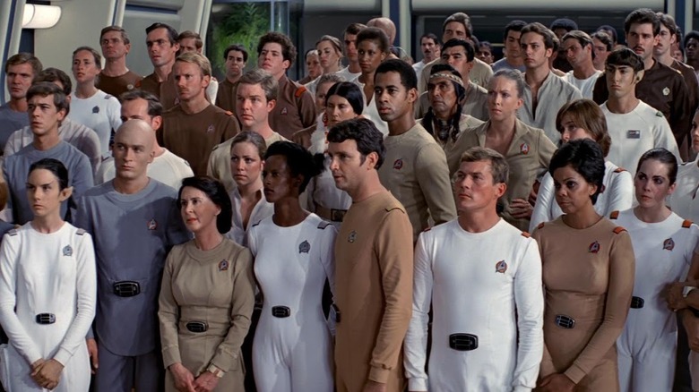 The Enterprise crew listens