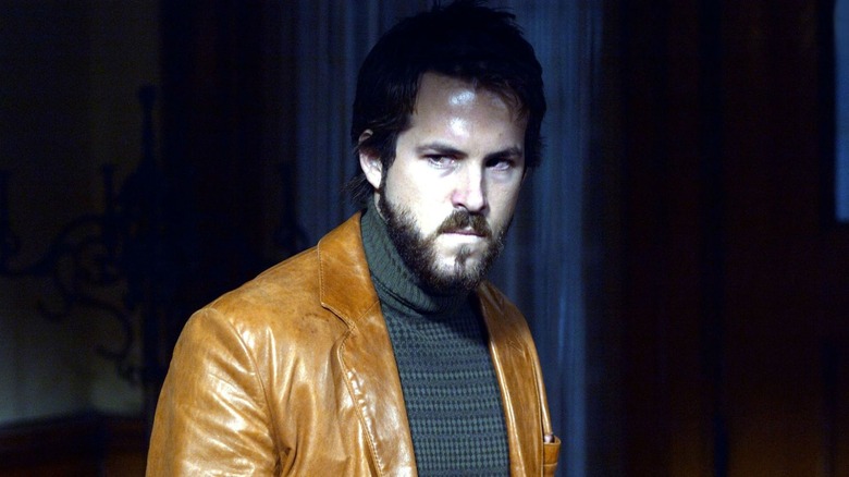 Ryan Reynolds glares