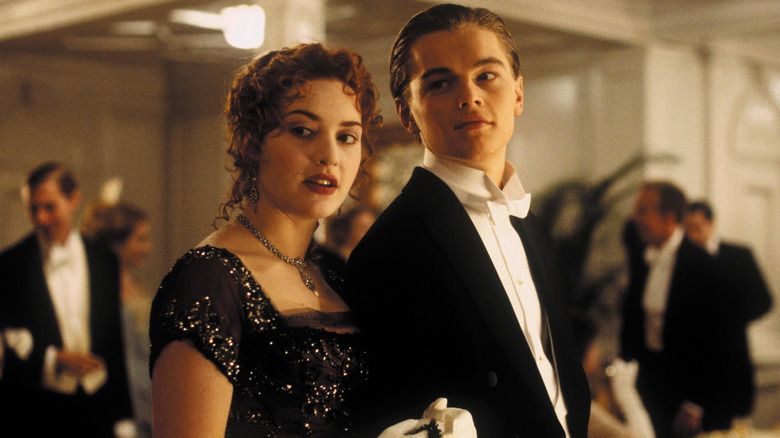 Rose and Jack walking into a party together in Titanic