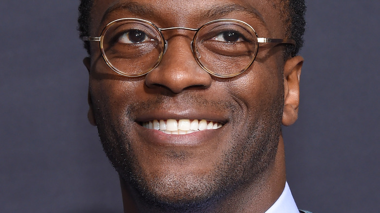 Aldis Hodge smiling at event