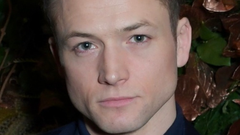 Taron Egerton posing for photographers