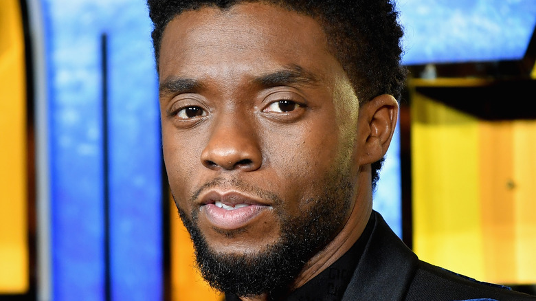 Chadwick Boseman looking into camera