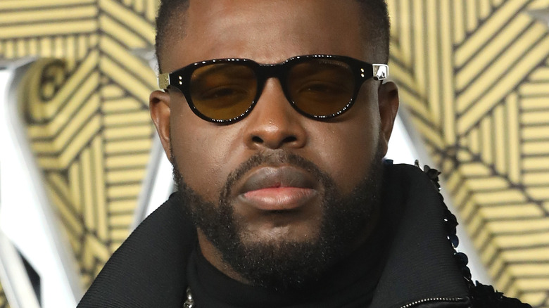 Winston Duke wearing sunglasses