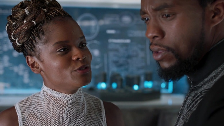 T'CHalla walking with Shuri in a lab