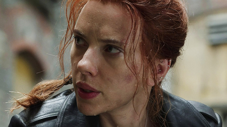 Black Widow raindrops on face