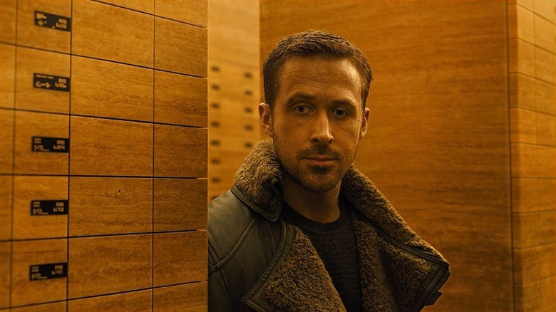 K hiding around a corner in Blade Runner 2049