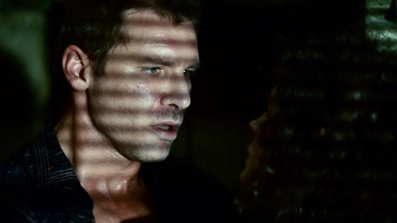 Deckard looks at Rachael