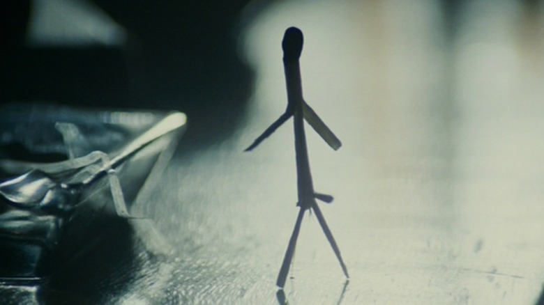 A matchstick man standing
