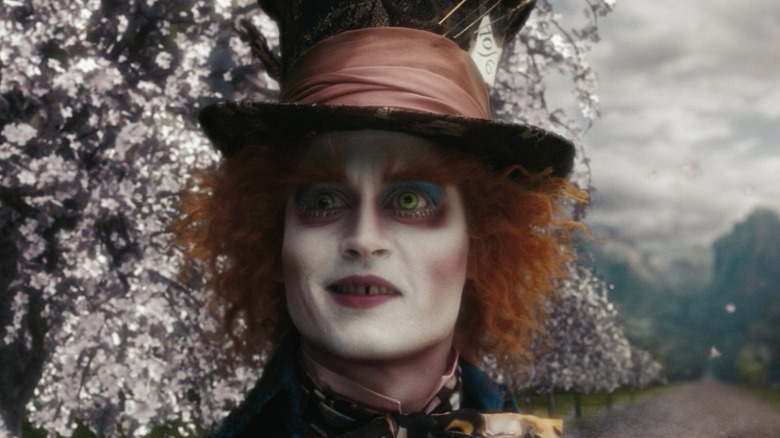 Mad Hatter half smiles