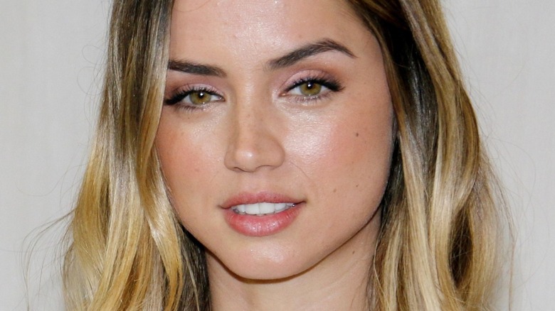 Ana De Armas smiles