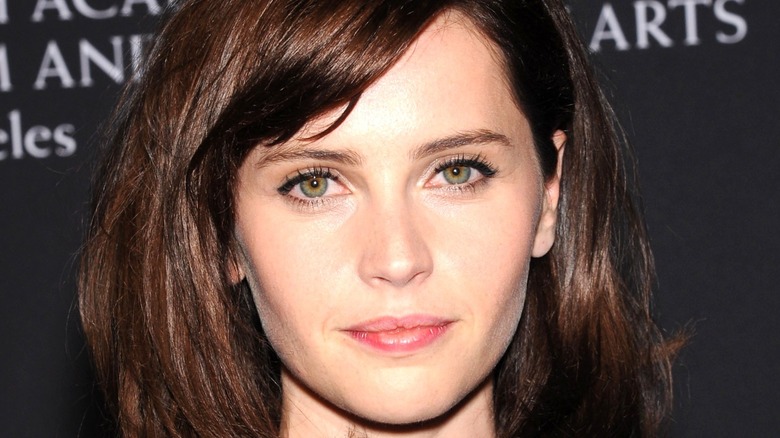 Felicity Jones looking directly into camera