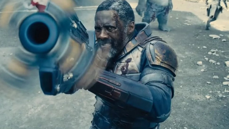 Bloodsport pointing a spinning gun in "The Suicide Squad" (2021)