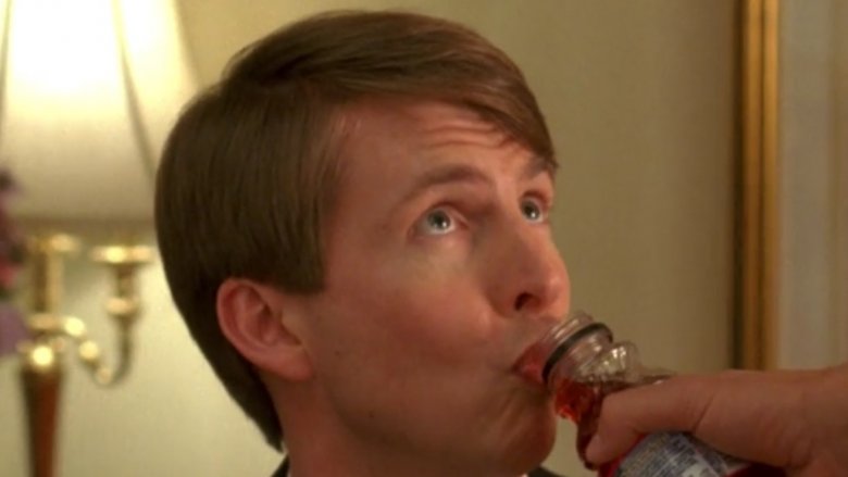 Kenneth Parcell drinking from a bottle of juice 30 Rock