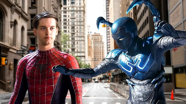 Blue Beetle stands next to Spider-Man