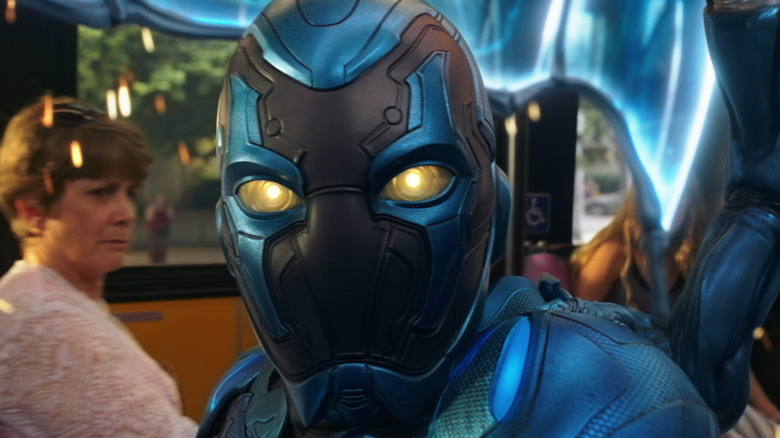 Blue Beetle stares