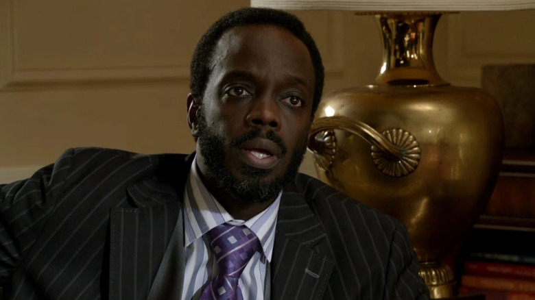 Potter in a pinstriped suit