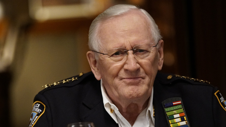 Henry smiling in his uniform in "Blue Bloods"