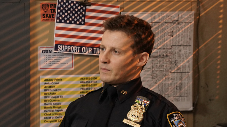 Jamie Reagan listening in "Blue Bloods"