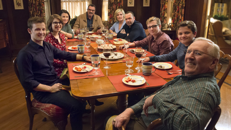 A behind the scenes shot of a Blue Bloods cast family dinner