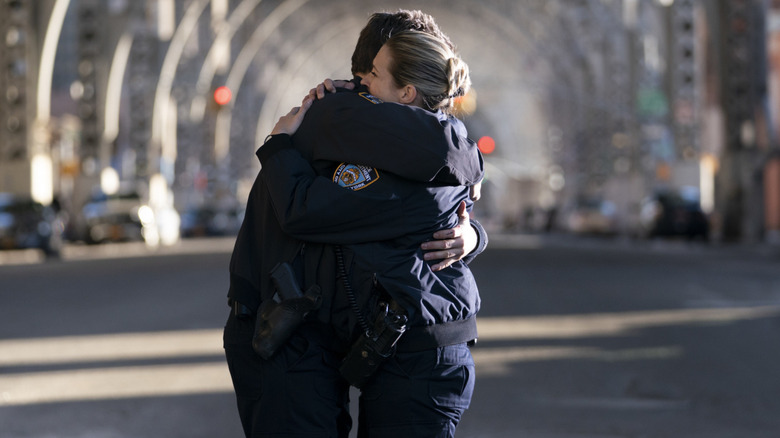 Jamie and Eddie hug in "Blue Bloods"