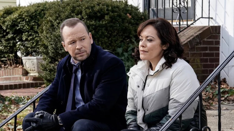 Danny and Baez sitting on stairs