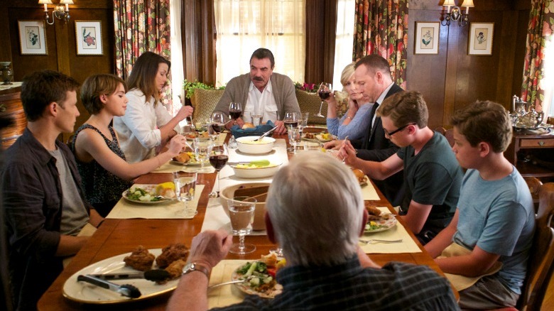 The Reagan family around a full table