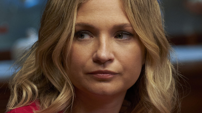 Vanessa Ray looking aside