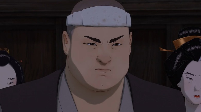 Ringo stares out with an angry expression