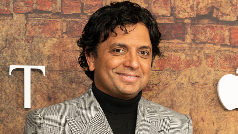 M. Night Shyamalan smiling