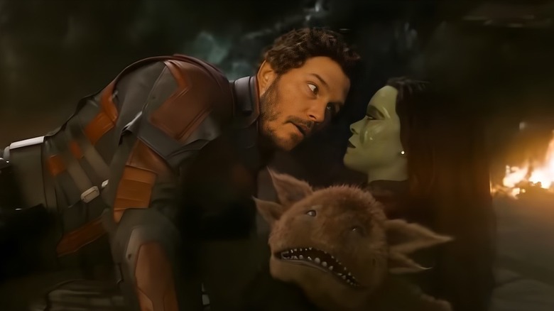 Star Lord and Gamora holding Blurp