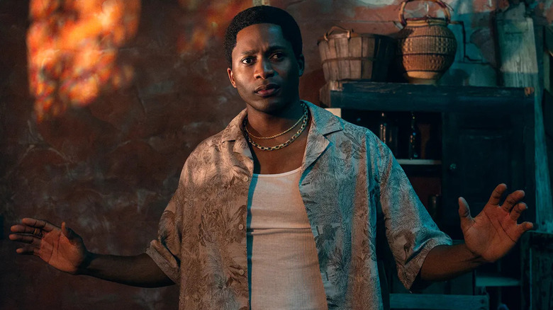 Terry holds up his hands in surrender in 