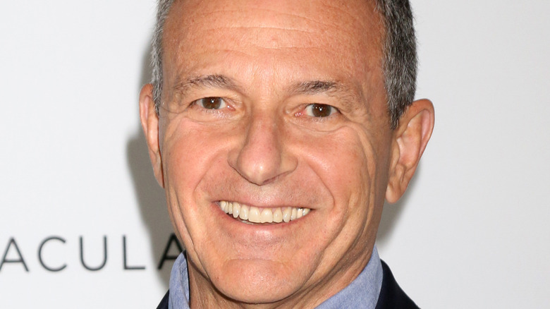 Bob Iger smiles at a premiere