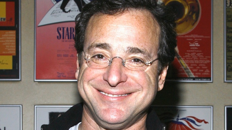 Bob Saget with a big smile on his face