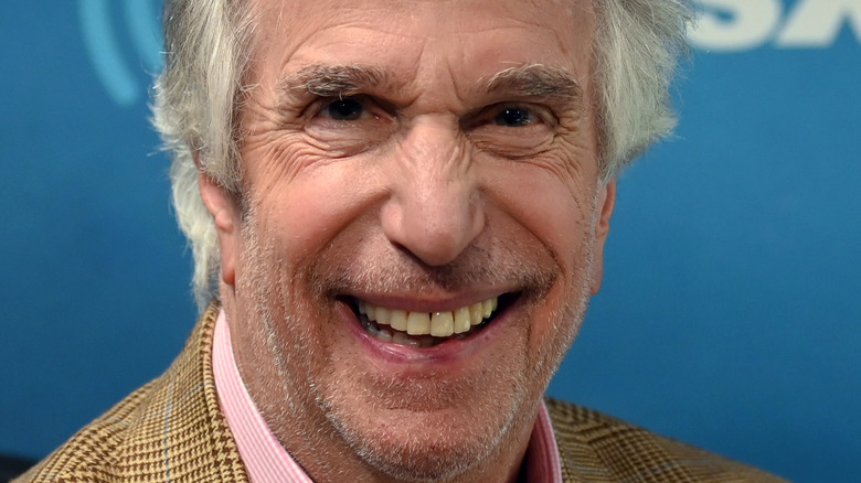 Henry Winkler grinning broadly 