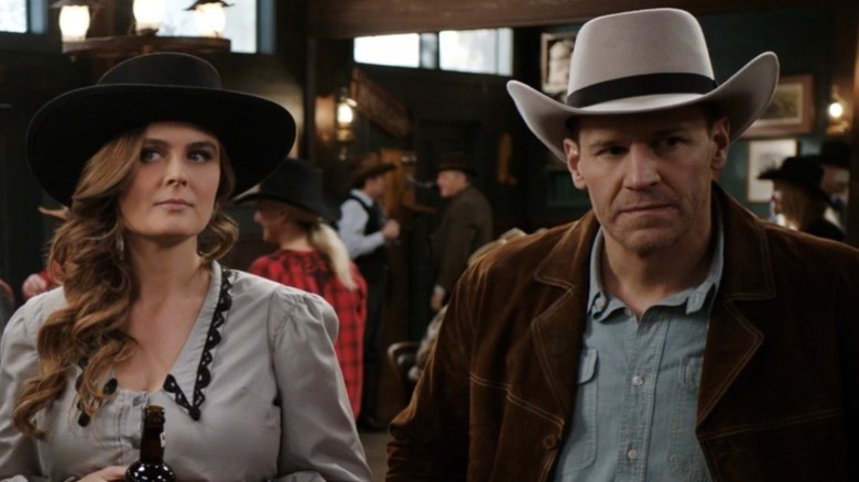 Bones and Booth in hats