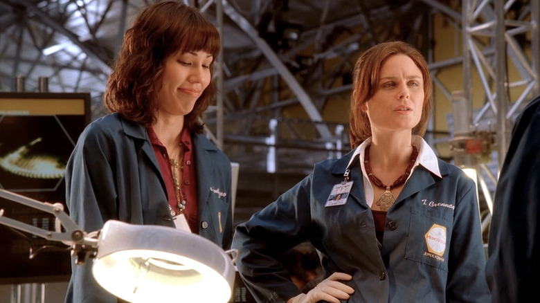 Brennan wearing Jeffersonian uniform