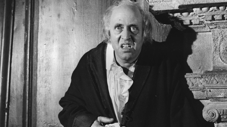 Ebenezer Scrooge talks to a ghost in 'A Christmas Story' (1951)